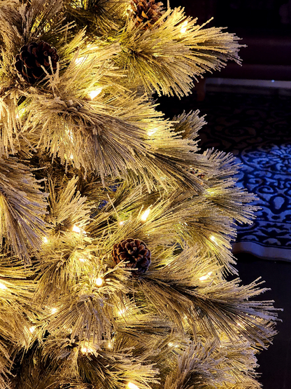 ÁRVORE PINHEIRO NEVADO NASSAU 537 GALHOS COM 400 LEDS WARM 2,10CM